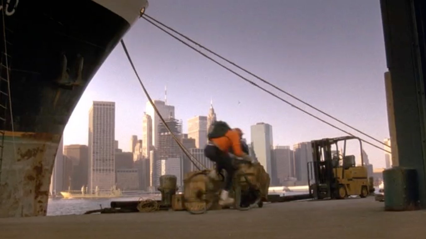 Who's That Girl? (1987): skyline cameo of the World Trade Center, both towers (with antenna)
